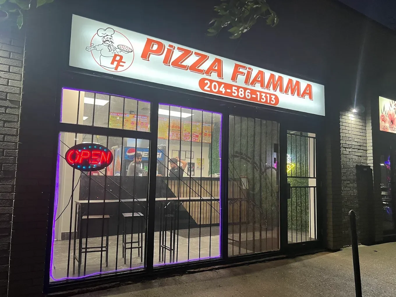 Pizza Fiamma restaurant interior on Keewatin Street in northwest Winnipeg